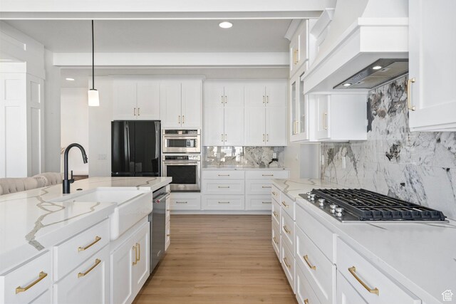 648 W 400 N, Mapleton, UT 84664 - kitchen with appliances with stainless steel finishes, custom range hood, a sink, white cabinets, and recessed lighting