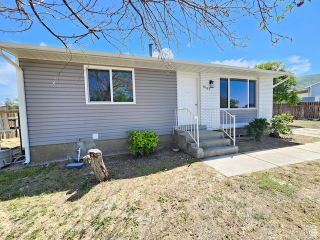 8181 W Danbury Dr, Magna, UT 84044 - ranch-style home with brick siding and entry steps