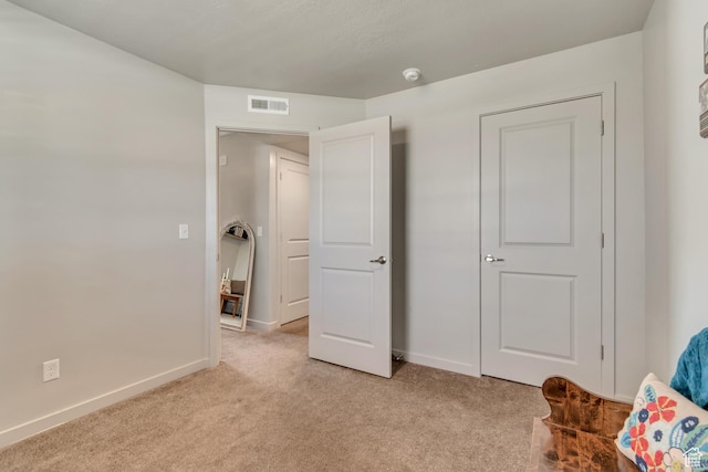 1700 Sandhill Rd Unit H301, Orem, UT 84058 - living area featuring light colored carpet and baseboards