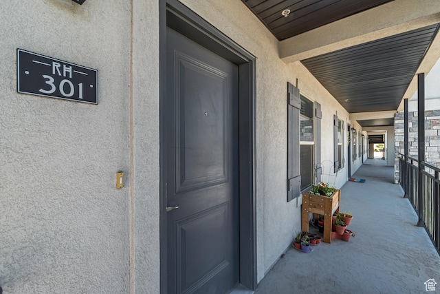 1700 Sandhill Rd Unit H301, Orem, UT 84058 - doorway to property with stucco siding