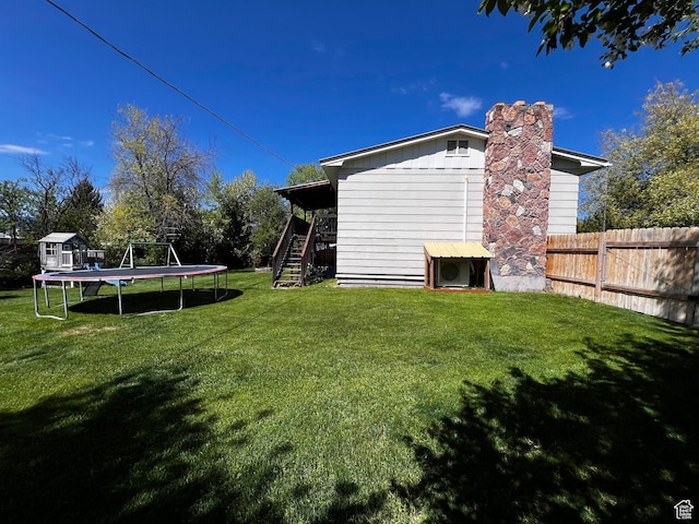 130 Cascade Quey St, Soda Springs, ID 83276 - view of yard with a trampoline and stairway