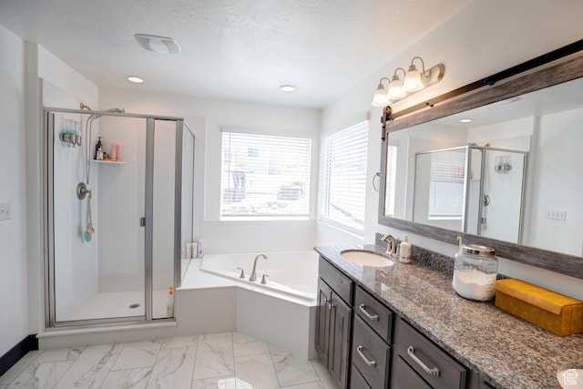 343 W Deer Creek Trl, Salem, UT 84653 - full bathroom featuring a shower stall, vanity, a garden tub, marble finish flooring, and a textured ceiling