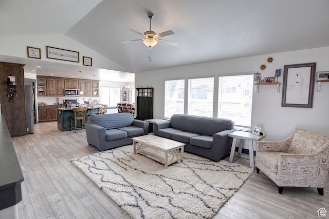 343 W Deer Creek Trl, Salem, UT 84653 - living room featuring ceiling fan, light wood-style flooring, and high vaulted ceiling