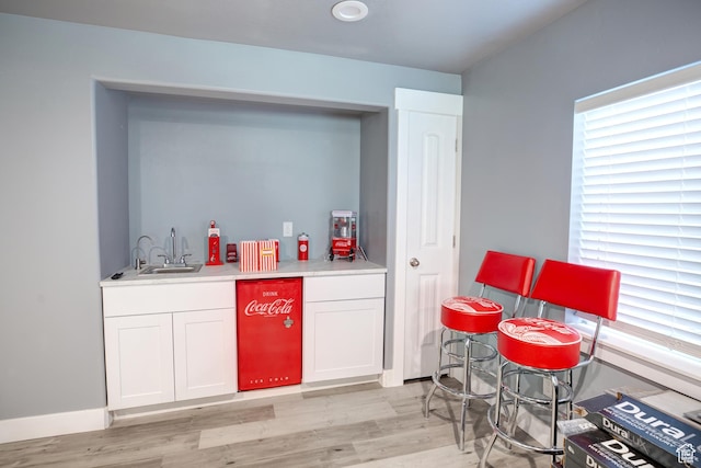 343 W Deer Creek Trl, Salem, UT 84653 - indoor wet bar featuring light wood-type flooring and baseboards