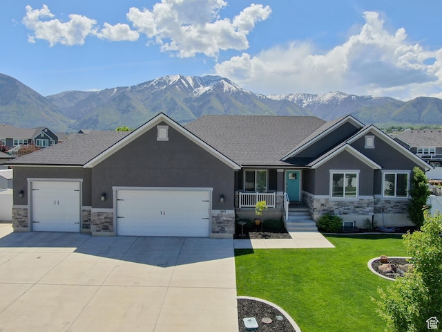 343 W Deer Creek Trl, Salem, UT 84653 - craftsman house featuring stone siding, a mountain view, a garage, and concrete driveway