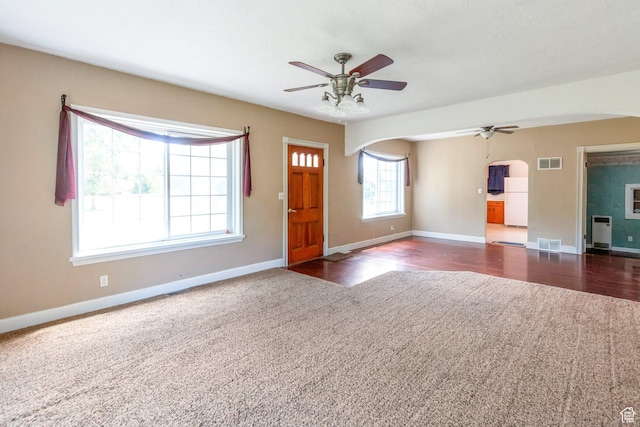 1463 E 12300 N, Cove, UT 84320 - entryway featuring arched walkways, ceiling fan, baseboards, and carpet floors