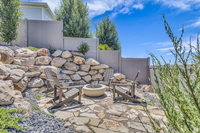 3651 N 200 E, North Ogden, UT 84414 - view of patio with an outdoor fire pit