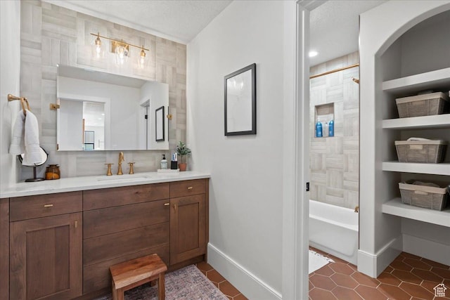 3651 N 200 E, North Ogden, UT 84414 - full bath with vanity, baseboards, tub / shower combination, tile patterned flooring, and a textured ceiling