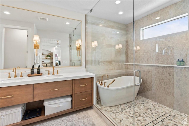 3651 N 200 E, North Ogden, UT 84414 - bathroom with double vanity, a freestanding tub, a stall shower, recessed lighting, and tile patterned flooring