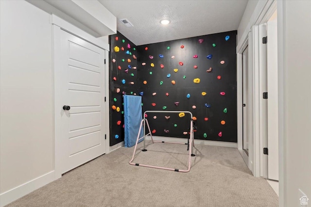 325 N 1200 E, American Fork, UT 84003 - unfurnished bedroom with carpet flooring, wallpapered walls, an accent wall, baseboards, and a textured ceiling