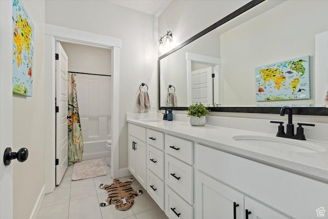 325 N 1200 E, American Fork, UT 84003 - full bathroom with double vanity, toilet, baseboards, and tile patterned floors