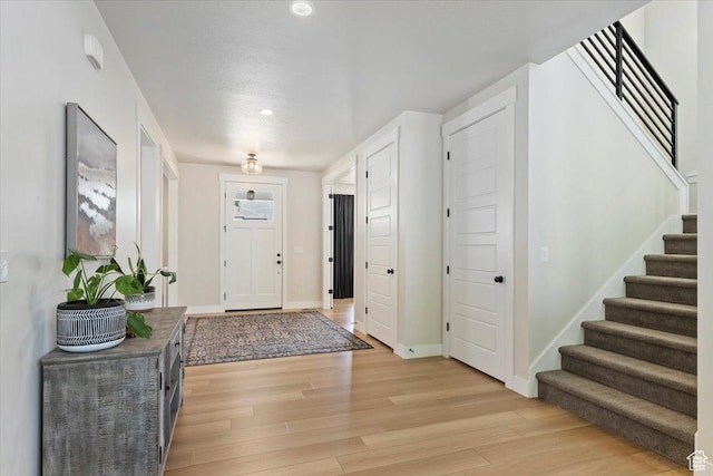 325 N 1200 E, American Fork, UT 84003 - foyer entrance featuring stairway, light wood finished floors, recessed lighting, and baseboards