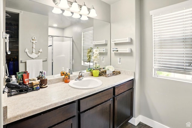 5186 W Hedgerose Dr S, Herriman, UT 84096 - bathroom with a shower stall, vanity, and baseboards