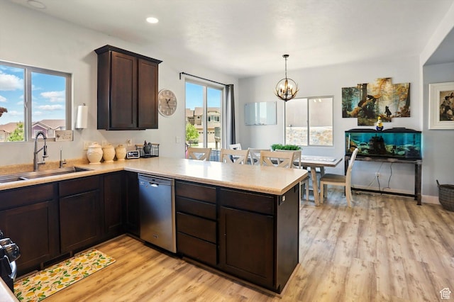 5186 W Hedgerose Dr S, Herriman, UT 84096 - kitchen featuring stainless steel dishwasher, light countertops, a peninsula, light wood finished floors, and dark brown cabinets