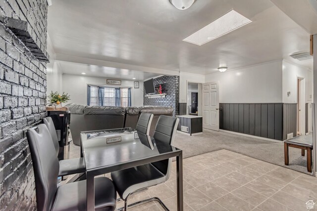 3067 W Lemay Ave S, West Valley City, UT 84119 - tiled dining room with a wainscoted wall and carpet flooring