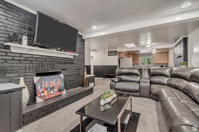 3067 W Lemay Ave S, West Valley City, UT 84119 - living room featuring light colored carpet, a fireplace, a wainscoted wall, and recessed lighting