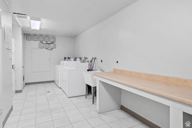1860 W 500 N Unit 7, Salt Lake City, UT 84116 - washroom featuring independent washer and dryer, a sink, light tile patterned flooring, and an office area