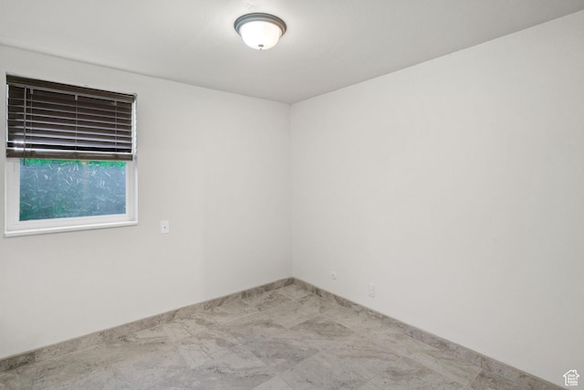 1860 W 500 N Unit 7, Salt Lake City, UT 84116 - spare room featuring baseboards