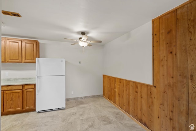 1860 W 500 N Unit 7, Salt Lake City, UT 84116 - kitchen featuring freestanding refrigerator, a ceiling fan, brown cabinets, light countertops, and baseboards