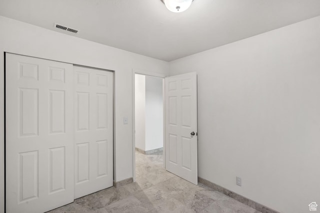 1860 W 500 N Unit 7, Salt Lake City, UT 84116 - unfurnished bedroom with baseboards and a closet