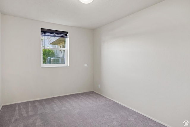 1860 W 500 N Unit 7, Salt Lake City, UT 84116 - spare room featuring carpet flooring and baseboards