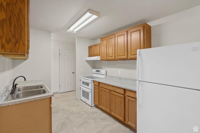 1860 W 500 N Unit 7, Salt Lake City, UT 84116 - kitchen with white appliances, a sink, under cabinet range hood, and light countertops