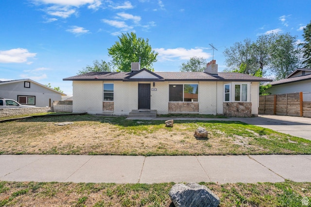 4589 S Trojan Dr, West Valley City, UT 84120 - single story home with a chimney