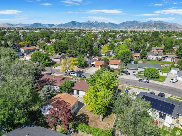 4589 S Trojan Dr, West Valley City, UT 84120 - aerial perspective of suburban area with a mountainous background