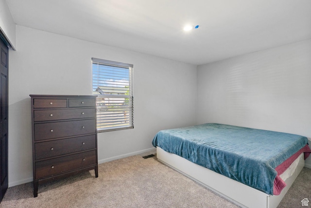 4589 S Trojan Dr, West Valley City, UT 84120 - bedroom with light colored carpet and baseboards