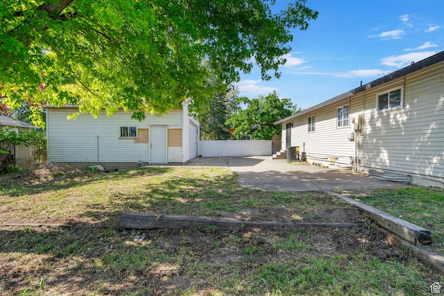 4589 S Trojan Dr, West Valley City, UT 84120 - view of yard with a patio area and central AC unit