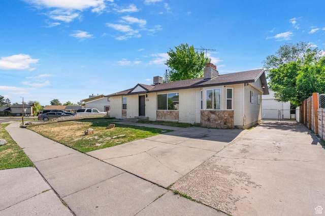 4589 S Trojan Dr, West Valley City, UT 84120 - ranch-style home with a chimney