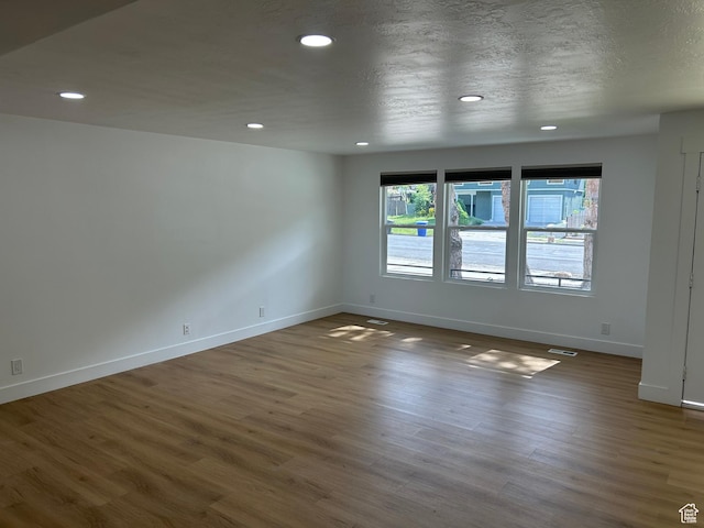 7726 S 3500 E, Cottonwood Heights, UT 84121 - spare room with baseboards, recessed lighting, and wood finished floors