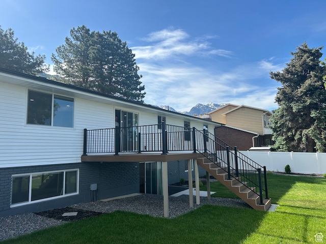 7726 S 3500 E, Cottonwood Heights, UT 84121 - back of property with stairs and a wooden deck