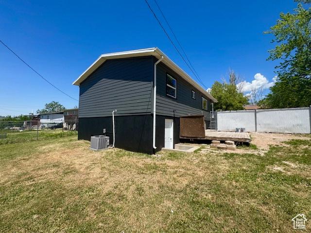 933 E 1150 N, Ogden, UT 84404 - back of property featuring a deck and central AC