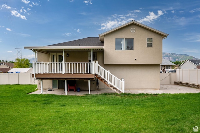 679 W 3600 S, Riverdale, UT 84405 - back of property with a patio, a deck with mountain view, stairway, and stucco siding