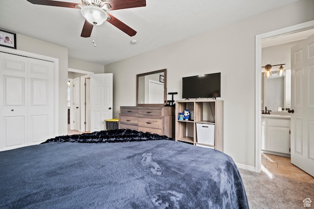 679 W 3600 S, Riverdale, UT 84405 - bedroom with carpet floors, a sink, a ceiling fan, baseboards, and a closet