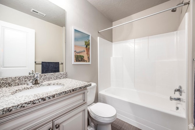 1722 W Naxos Ln, South Jordan, UT 84095 - bathroom featuring toilet, bathing tub / shower combination, vanity, and a textured ceiling