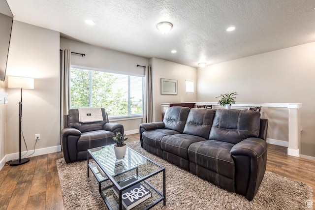 1722 W Naxos Ln, South Jordan, UT 84095 - living area with a textured ceiling, baseboards, wood finished floors, and recessed lighting