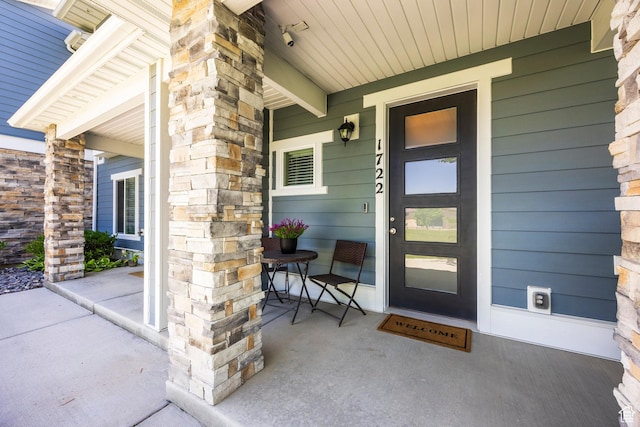 1722 W Naxos Ln, South Jordan, UT 84095 - entrance to property with a porch and stone siding