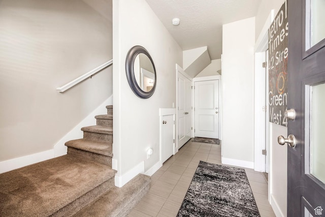 1722 W Naxos Ln, South Jordan, UT 84095 - tiled foyer entrance with stairway and baseboards