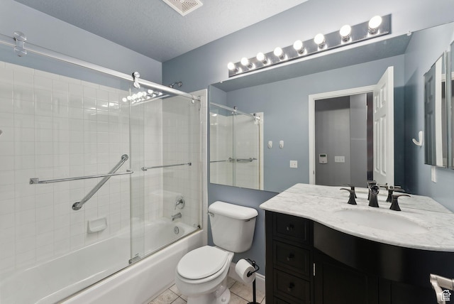 192 Starboard Ln, Stansbury Park, UT 84074 - bathroom with toilet, vanity, shower / bath combination with glass door, and tile patterned floors