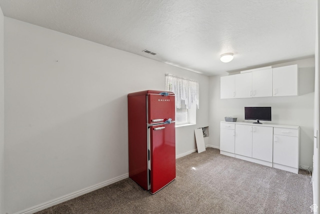 192 Starboard Ln, Stansbury Park, UT 84074 - interior space with carpet flooring, a textured ceiling, baseboards, and an office area