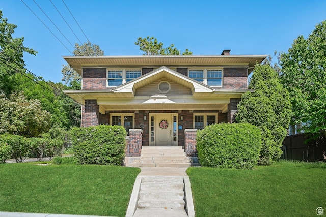 114 N Virginia St, Salt Lake City, UT 84103 - view of front of property with brick siding, a chimney, and covered porch