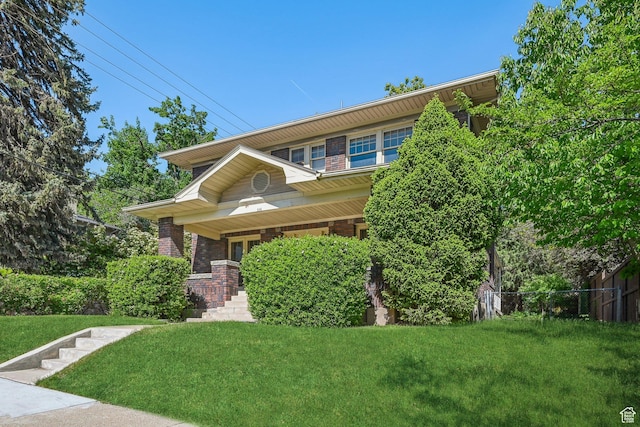 114 N Virginia St, Salt Lake City, UT 84103 - view of front of property featuring a porch and brick siding