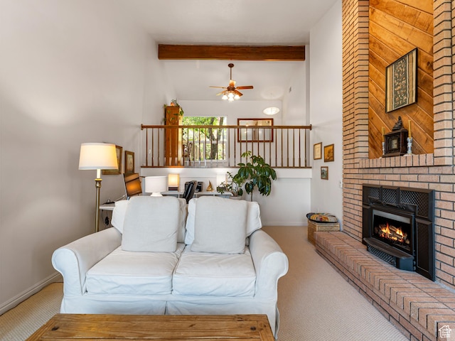 4968 S Partridge Way E, Ogden, UT 84403 - living room with carpet, ceiling fan, beamed ceiling, a brick fireplace, and baseboards
