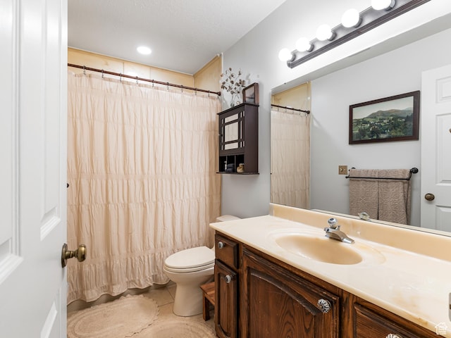 4968 S Partridge Way E, Ogden, UT 84403 - full bath with vanity, toilet, tile patterned flooring, and a shower with shower curtain