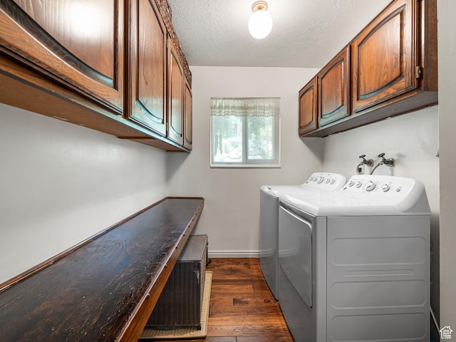 4968 S Partridge Way E, Ogden, UT 84403 - washroom with cabinet space, dark wood-style floors, washing machine and clothes dryer, baseboards, and a textured ceiling