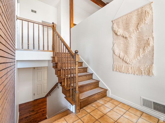 4968 S Partridge Way E, Ogden, UT 84403 - staircase with a high ceiling and baseboards