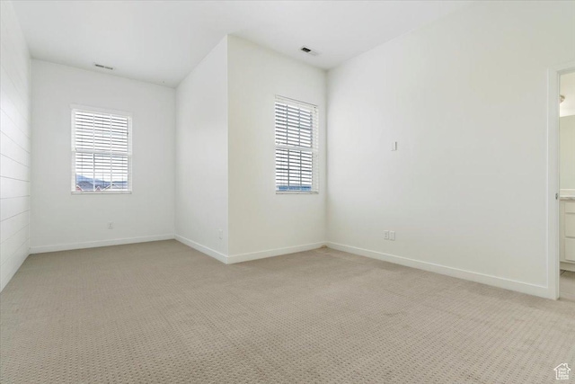 5377 W Bowstring Way S, Jordan, UT 84009 - empty room featuring light colored carpet, healthy amount of natural light, and baseboards