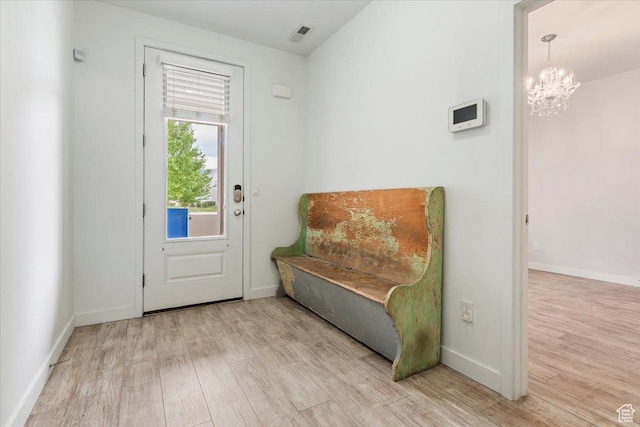 5377 W Bowstring Way S, Jordan, UT 84009 - sitting room featuring wood finished floors, a chandelier, and baseboards
